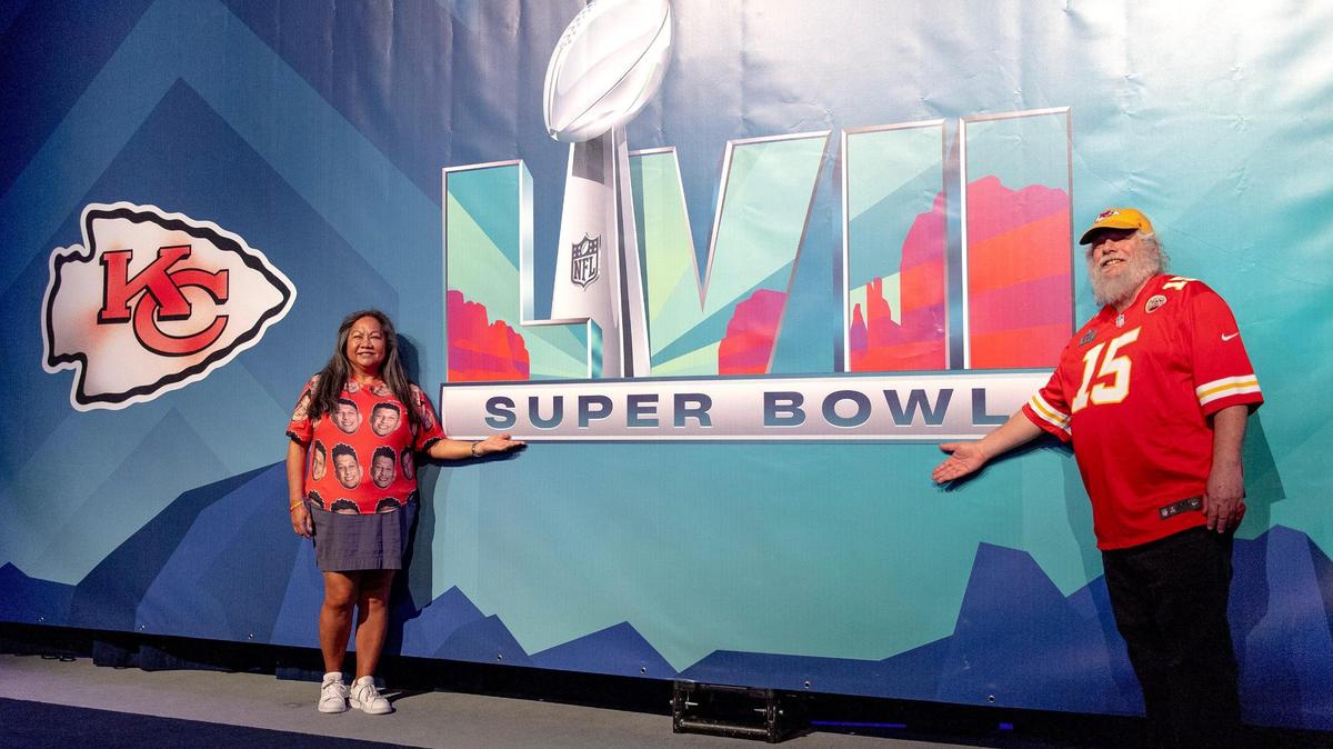 Leah and Dan Winter of Cypress, Calif., pose for a photo at the NFL’s Super Bowl Experience on Thursday, Feb. 9, 2023, in Phoenix.