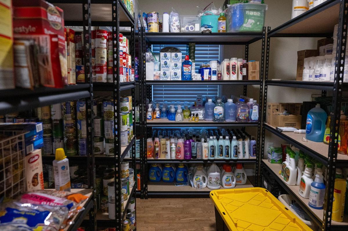 A pantry stocked with food and household essentials is seen at the new Hillcrest Transitional Housing facility, Wednesday, Nov. 20, 2024, in Kansas City, Kansas.