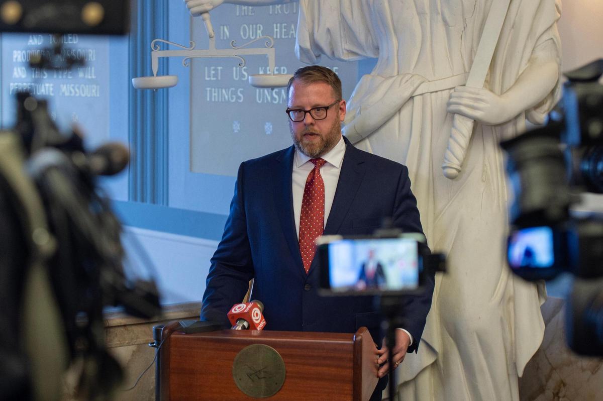 Clay County Prosecuting Attorney Zachary Thompson holds a press conference at the old Liberty Courthouse on Tuesday, Feb. 14, 2023, in Liberty, Mo. Thompson announced the nine felony charges by way of grand jury indictment in the case of Timothy M. Haslett Jr., a 40-year-old Excelsior Springs man accused of keeping a 22-year-old woman captive in his basement for weeks.