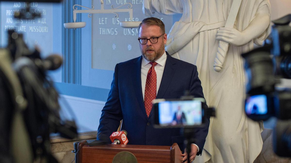 Clay County Prosecuting Attorney Zachary Thompson holds a press conference at the old Liberty Courthouse on Tuesday, Feb. 14, 2023, in Liberty, Mo. Thompson announced the nine felony charges by way of grand jury indictment in the case of Timothy M. Haslett Jr., a 40-year-old Excelsior Springs man accused of keeping a 22-year-old woman captive in his basement for weeks.