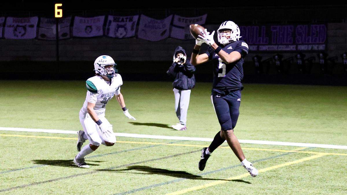 Blue Valley Northwest’s Ayden McGibboney hauls in a 16-yard touchdown pass during a 49-14 playoff win over Free State in the Kansas high school football playoffs on Friday night, Nov. 8, 2024.