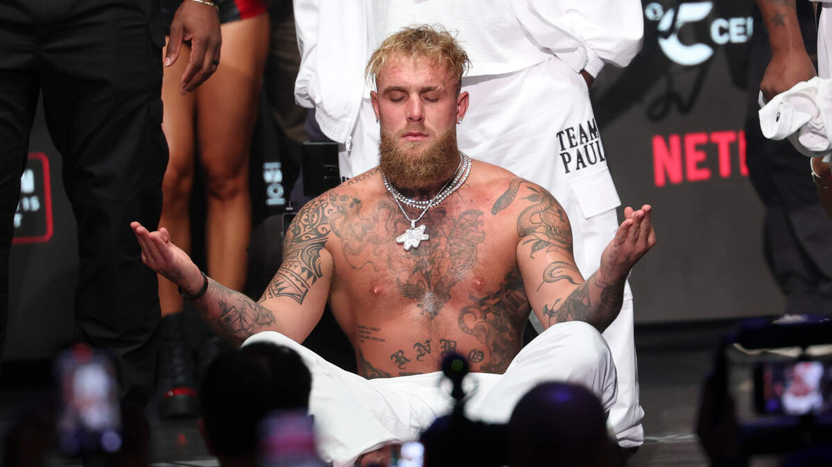 Jake Paul weighs in the day before his fight against Mike Tyson at the Toyota Music Factory.