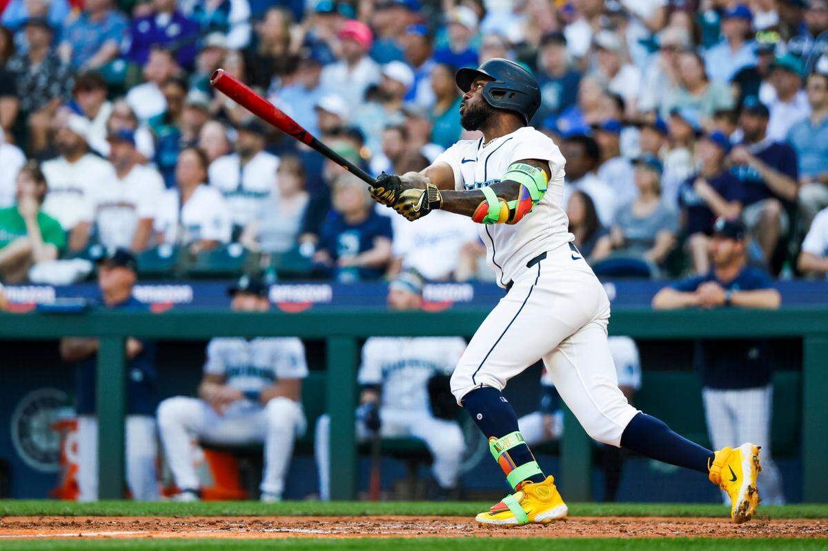Mariners left fielder Randy Arozarena belts one of his two home runs against the Kansas City Royals during a June 30, 2025 game at T-Mobile Park in Seattle.
