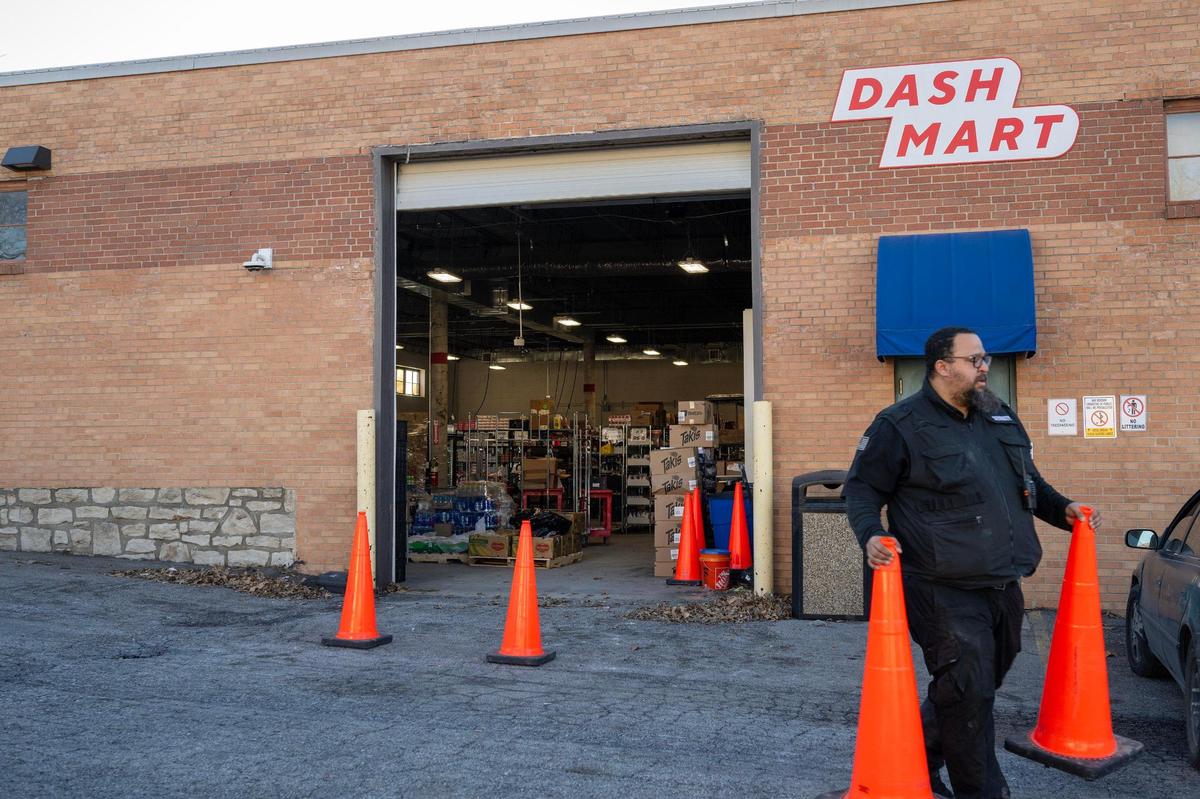 The inside of DashMart is visible as the garage door is lifted on Feb. 27 in Kansas City.