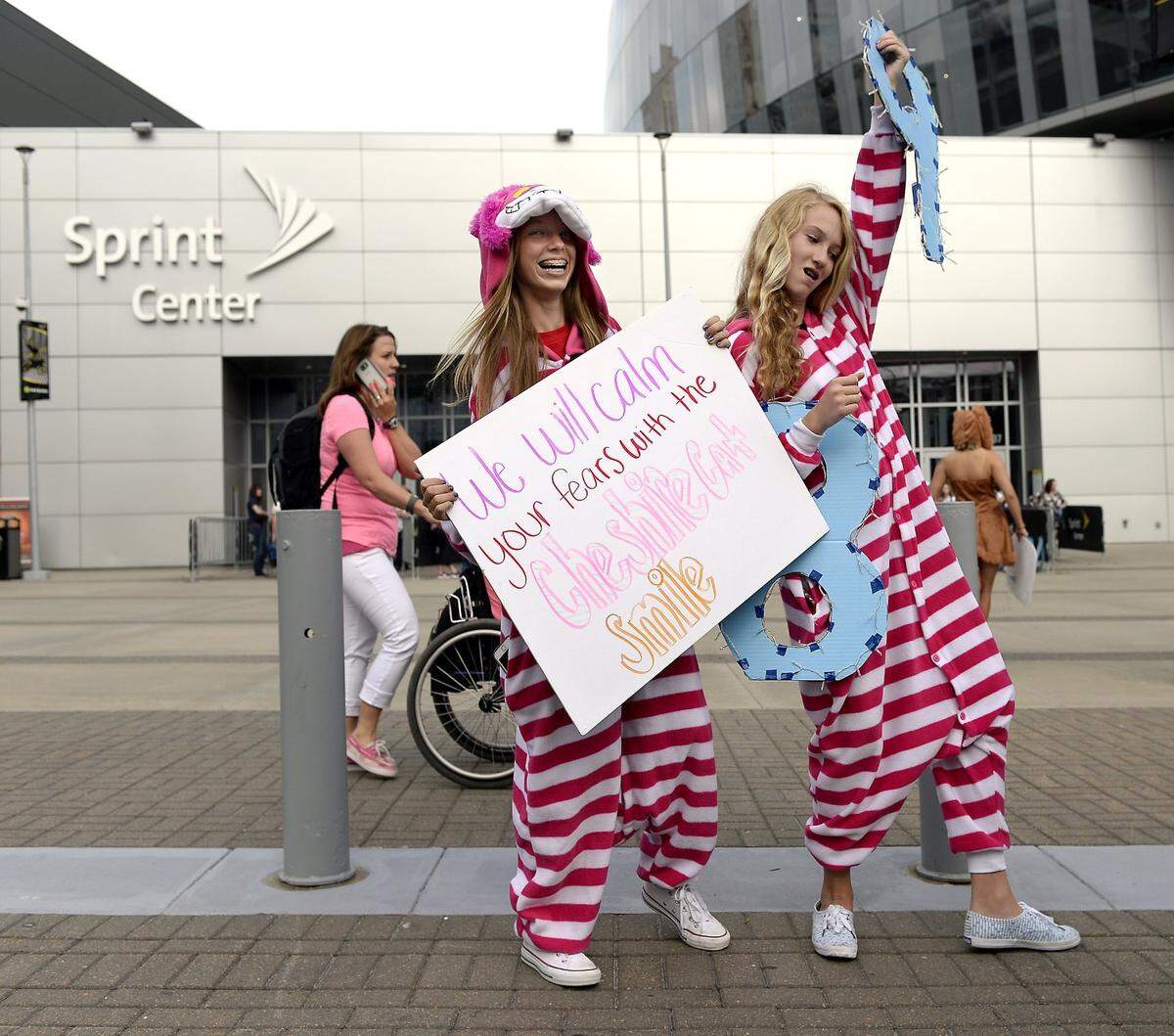 Taylor Swift fans gathered in front of the Sprint Center Sept. 21, 2015, to attend the first of Swift’s two shows in Kansas City. Best friends Katie Muckerman (left), 14, and Ellie Johnson, 13, both of Overland Park, wore a Cheshire Cat theme in reference to Swift’s Wonderland song on her latest album.