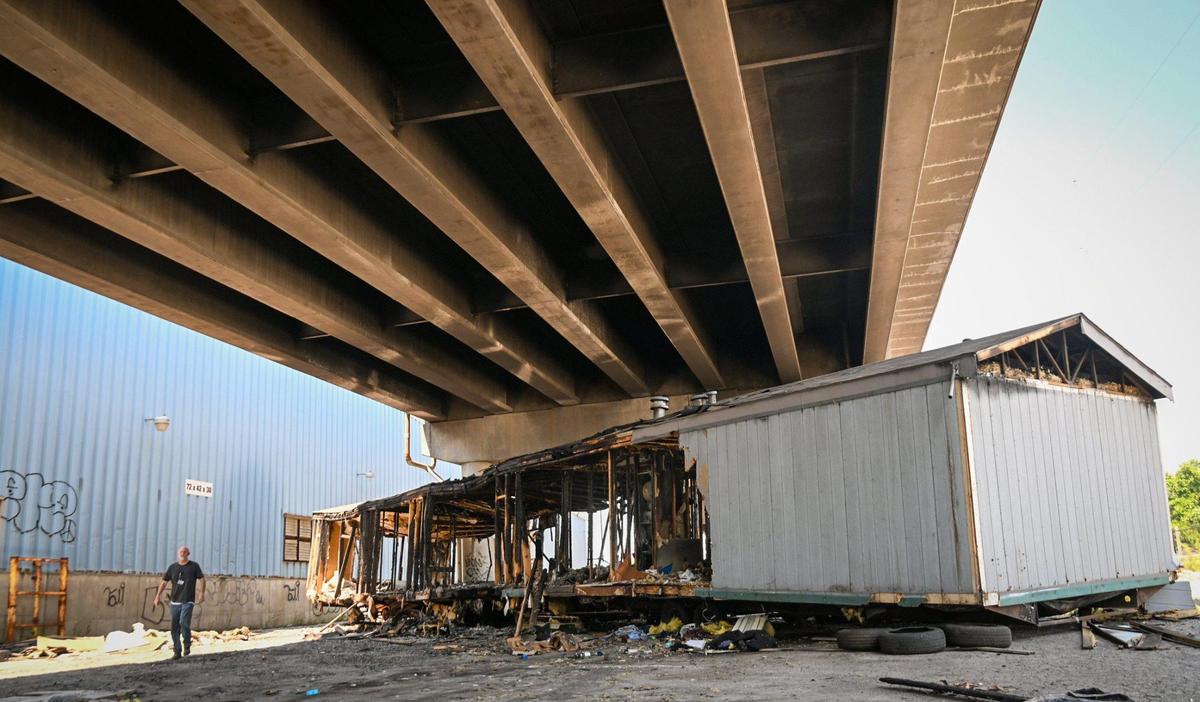 Alan Ashurst, an illegal dumping investigator for Kansas City, was on the scene Monday, Aug. 1, 2022, investigating a mobile home illegally dumped under the 23rd Street bridge at Manchester Trafficway.