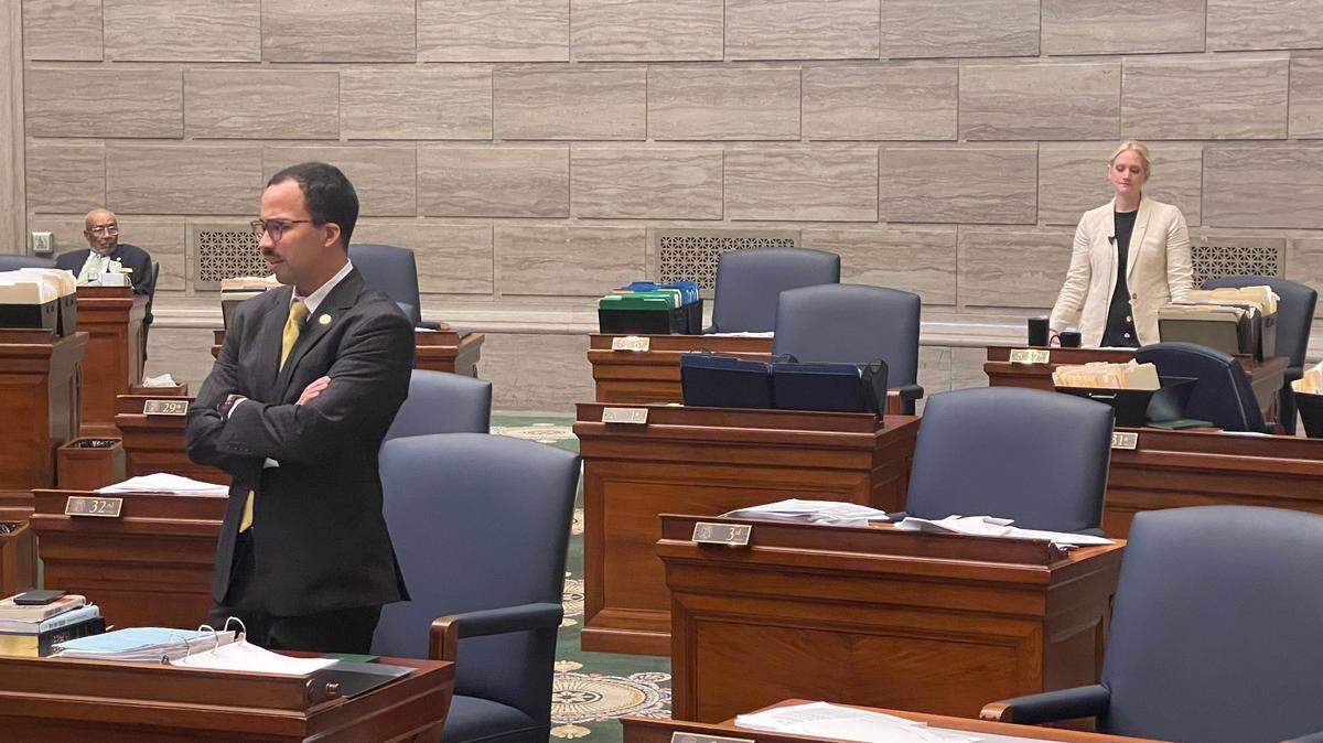 Missouri Democratic Sens. Steve Roberts from St. Louis (left) and Lauren Arthur from Kansas City (right) talk on the Senate floor on May 15, 2024.