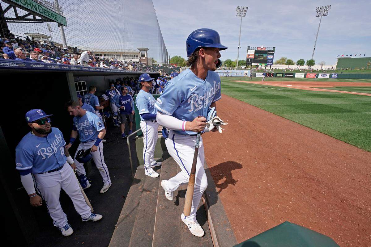 Kansas City Royals third baseman Bobby Witt Jr. jogs to the plate for a spring training at-bat against the Texas Rangers in Surprise, Ariz.