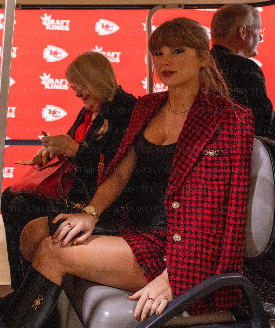 Pop star Taylor Swift arrives in a golf cart to attend an NFL game between the Kansas City Chiefs and the Denver Broncos on Sunday, Nov. 10, 2024, at GEHA Field at Arrowhead Stadium.