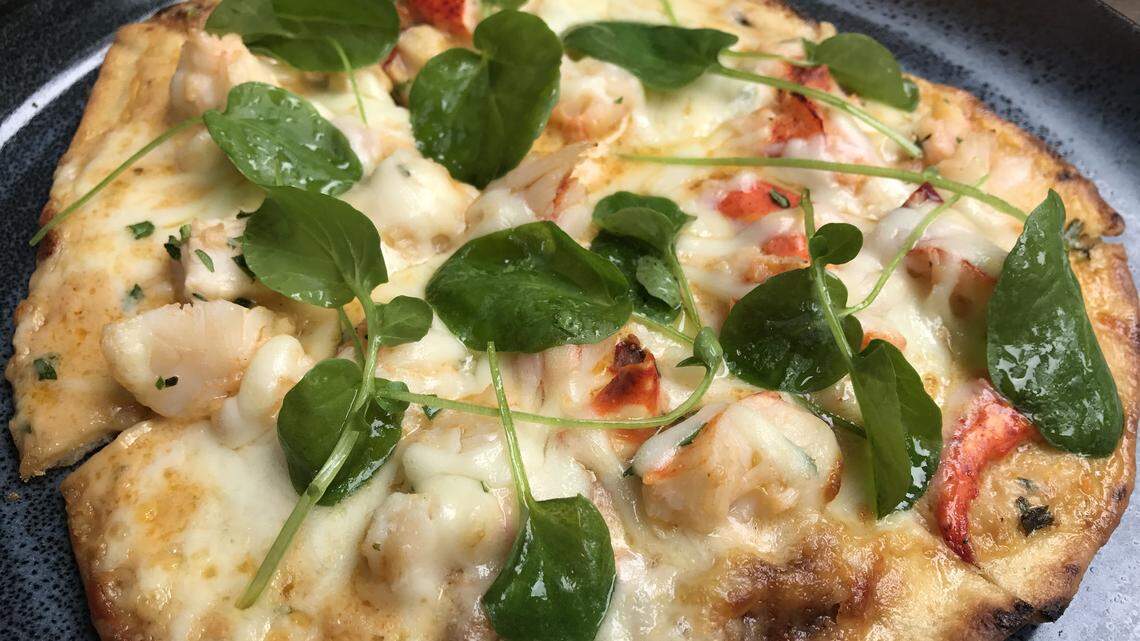Bristol’s new lobster pizza with lobster thermidor sauce, a cheese blend, basil oil-poached lobster sells for $16.