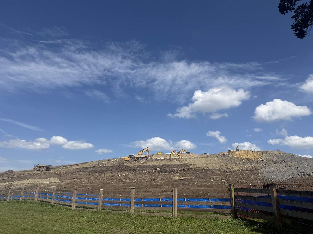 Construction crews working on land just outside Leawoof Dog Park in Leawood on July 2, 2026.