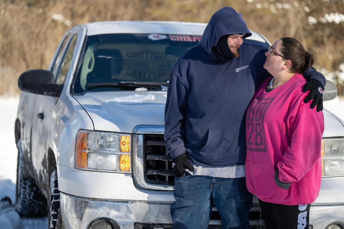“I want to teach my kids to be good people and to give back and help those who need it,” said Summer Gifford, right, who with her husband, Corey Sutton, have been coming to the aid of people needing help since a major snowstorm struck Kansas City. The couple lives in Kansas City, Kan. with their three sons.