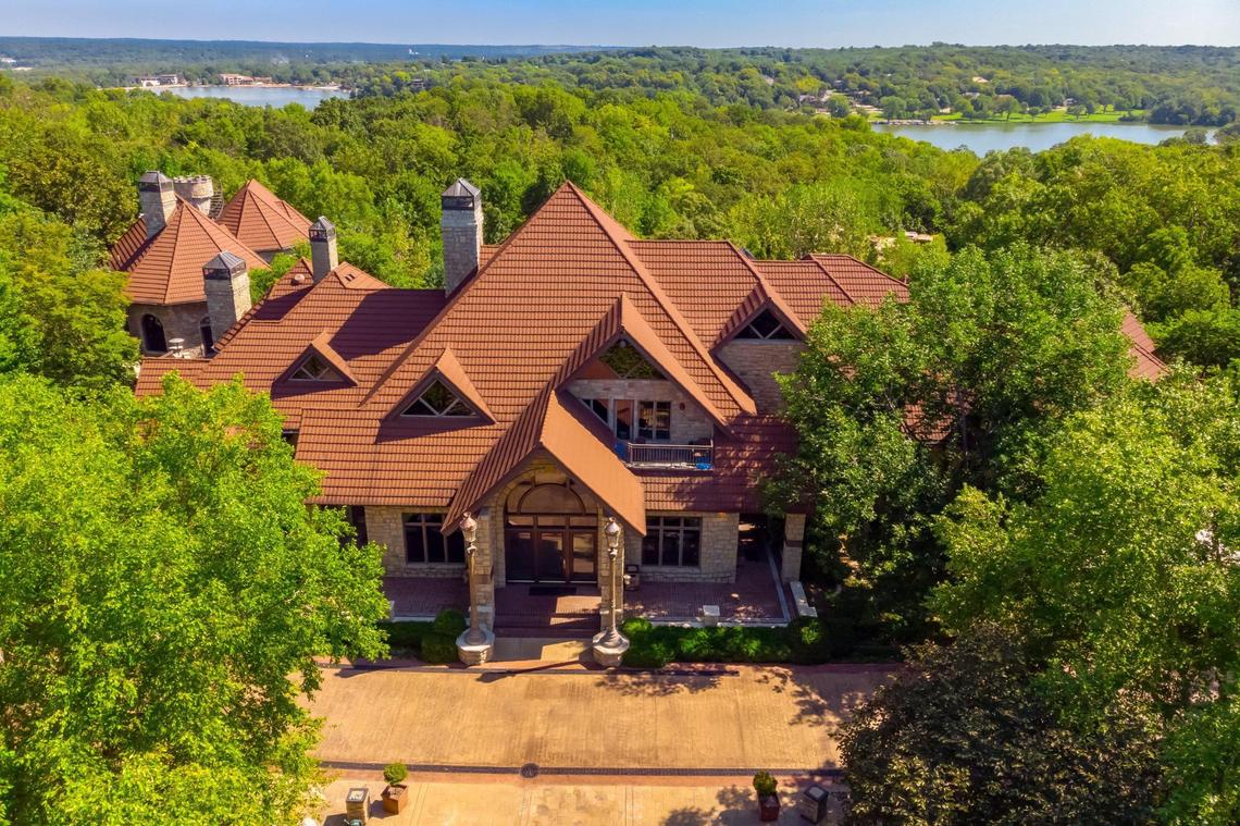 This Lake Quivira mega mansion at 5225 Renner Rd., will be auctioned off with no reserve by Concierge Auctions, which will accept bids July 23 through July 28.