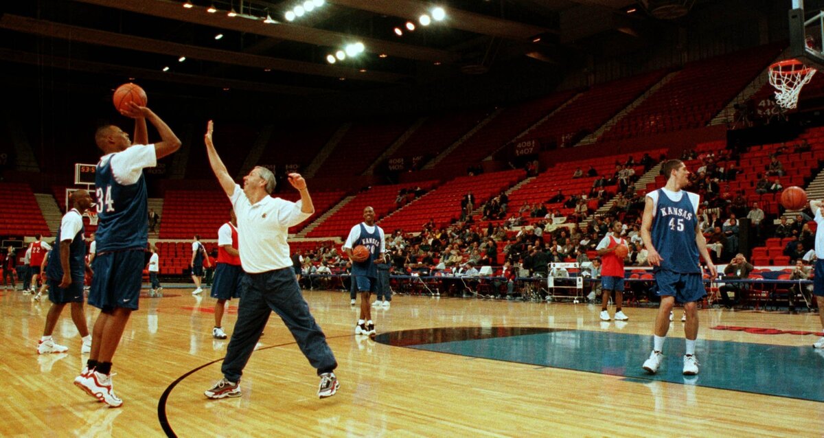 Roy Williams tries a flatfooted block of forward Paul Pierce during a 1998 practice in Oklahoma City, for the first round of the NCAA Tournament.