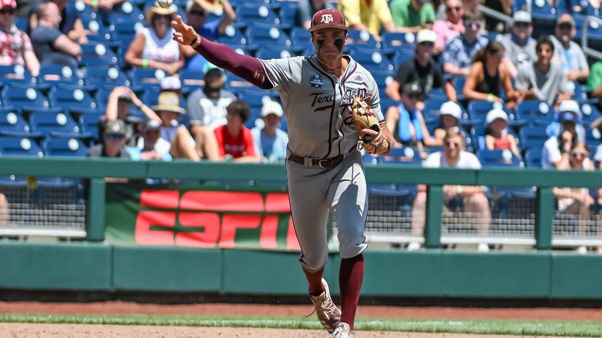 Texas A&M Aggies third baseman Trevor Werner (28) throws across the field against the Notre Dame Fighting Irish in the third inning at Charles Schwab Field.
