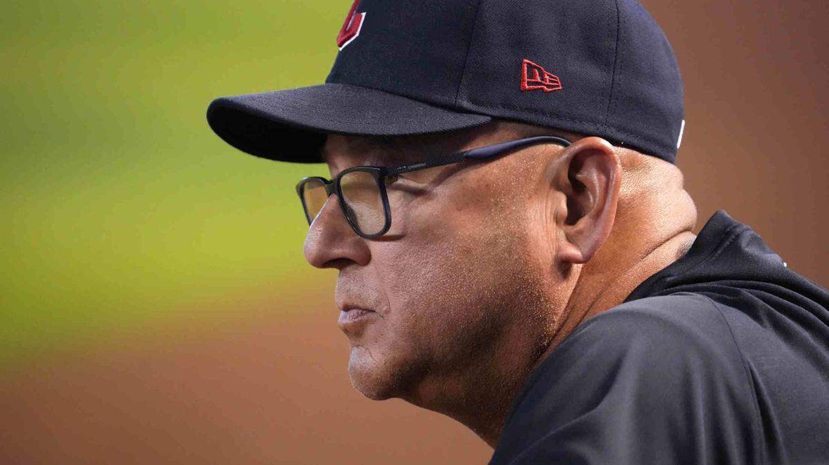Cleveland Guardians manager Terry Francona (77) looks on against the Arizona Diamondbacks during the third inning at Chase Field.