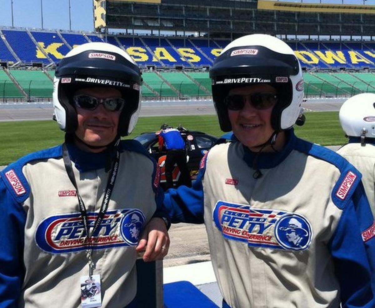 Sam Mellinger, right, took on the challenge of driving a NASCAR racecar around Kansas Speedway about 10 years ago with sports editor Jeff Rosen, left, and lived to tell about it.
