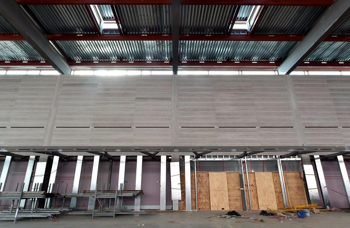 Limestone from near Springfield — the same that is used in the Missouri statehouse — is being installed above the ticketing counters at Kansas City International Airport’s new terminal.