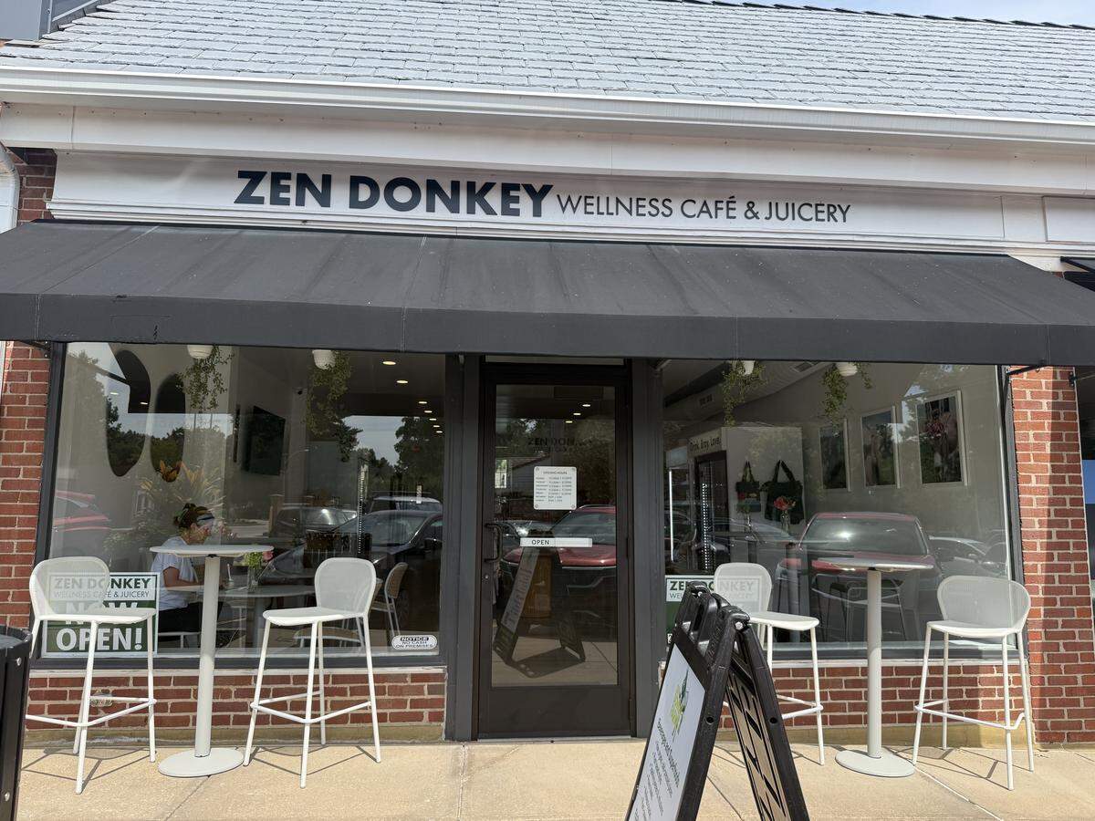 Tables sit outside the new Fairway cafe, which serves up juices, fresh smoothies and grab-and-go food items.
