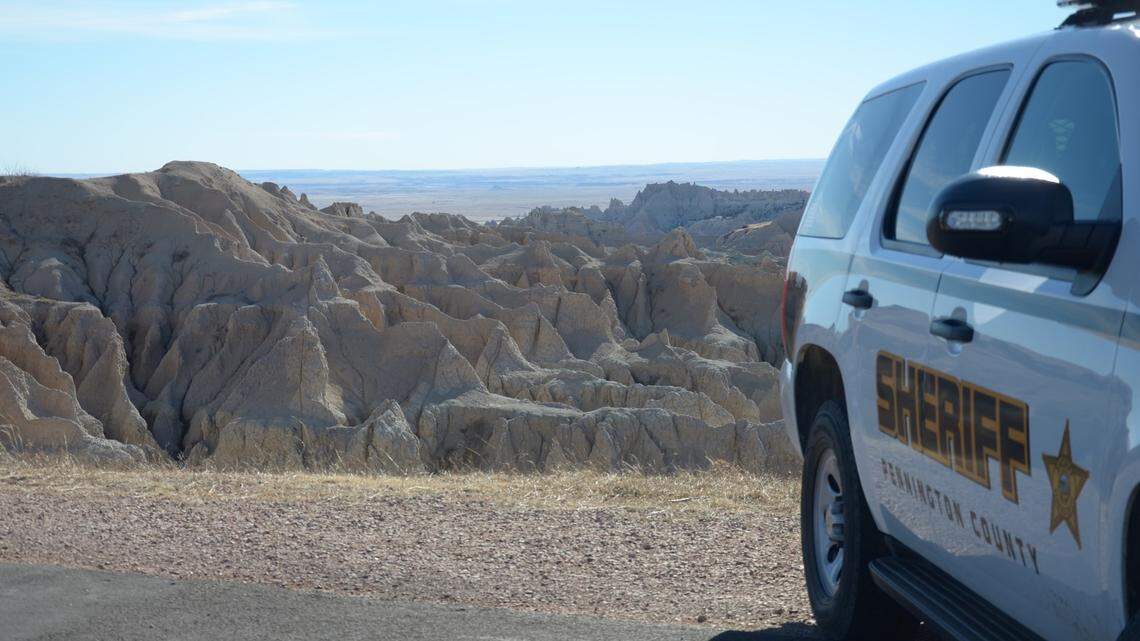 A 22-year-old from St. Louis died while hiking on an unmarked trail at Badlands National Park in South Dakota, officials say.