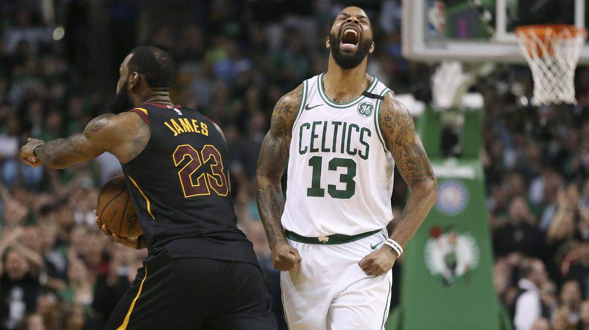 Boston Celtics forward Marcus Morris (right)  screamed during the second half in game 7 of the NBA Eastern Conference finals, Sunday, May 27, 2018, in Boston.