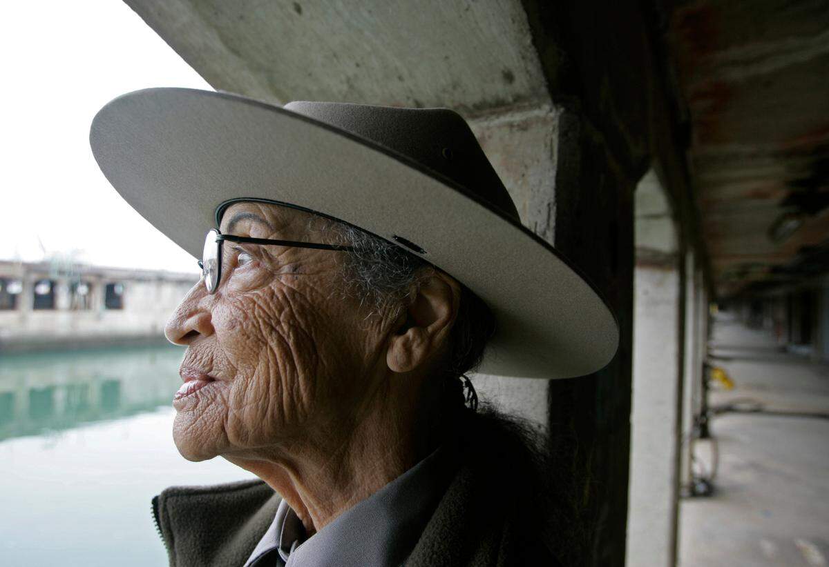Betty Reid Soskin, a community outreach worker at the Rosie the Riveter/World War II Home Front National Historic Park, looks out at the water from a dry dock area where woman worked during the war on Wednesday, Oct. 31, 2007 in Richmond, Calif. Soskin, 86, kept clerical records for the segregated union set up for black shipyard workers during World War II.
