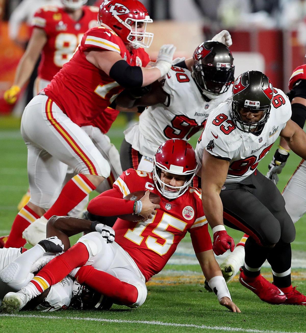 Kansas City Chiefs quarterback Patrick Mahomes is sacked by the Tampa Bay Buccaneers defense in the third quarrter Sunday, February 7, 2021, at Super Bowl LV at Raymond James Stadium in Tampa, Florida.