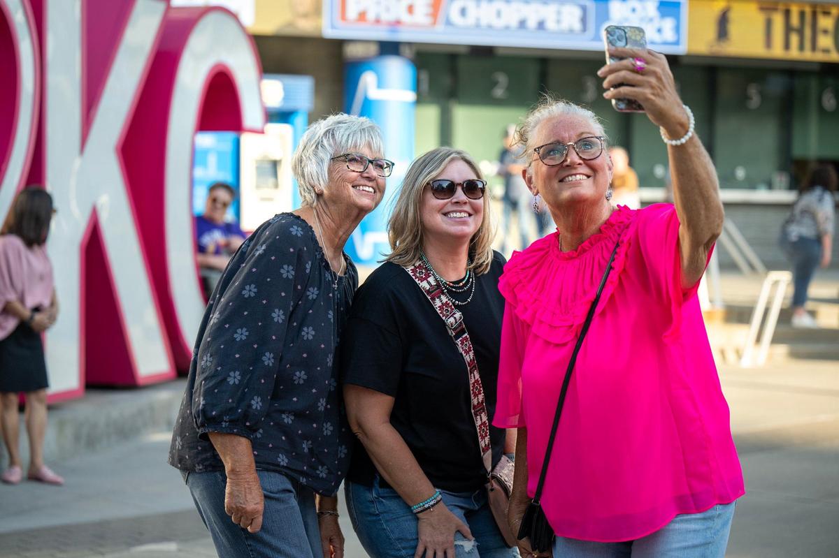 Sisters Kim Young, from left, Kristen Collier, and Adrian Reichert, took a selfie Sunday before the Barry Manilow concert at the T-Mobile Center. The sisters saw Manilow in concert in the 1980s at Kemper Arena.