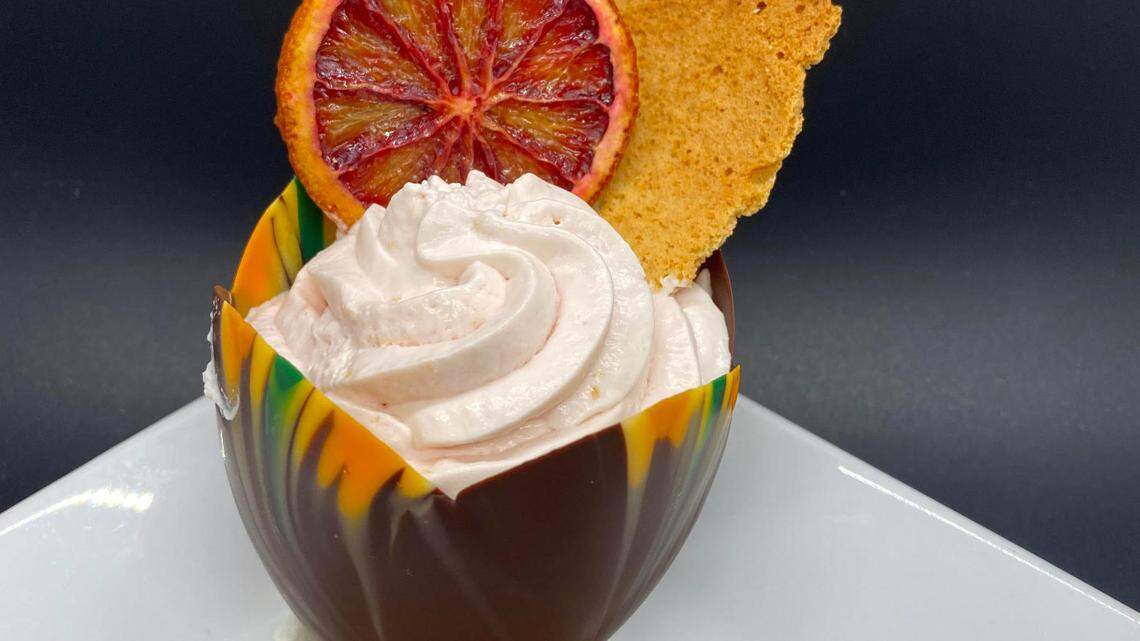 Affare’s chocolate cup filled with blood orange mousse.