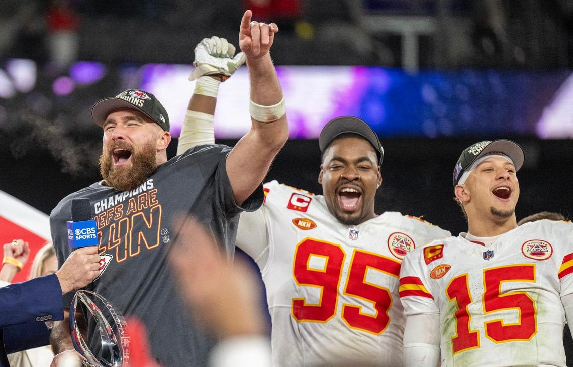 Kansas City Chiefs tight end Travis Kelce (87), left, celebrates with teammates defensive tackle Chris Jones (95) and quarterback Patrick Mahomes (15) after defeating the Baltimore Ravens 17-10 in the AFC Championship Game at M&T Bank Stadium on Sunday, Jan. 28, 2024, in Baltimore.