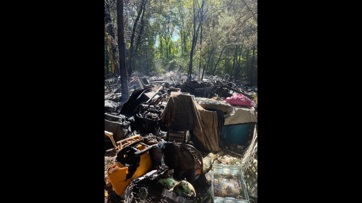 The Kansas City Kansas Fire Department was called out to a fire Sunday, Aug. 28, 2022, at a homeless encampment in a wooded area behind the Midway Shopping Center. No one was believed to be injured.