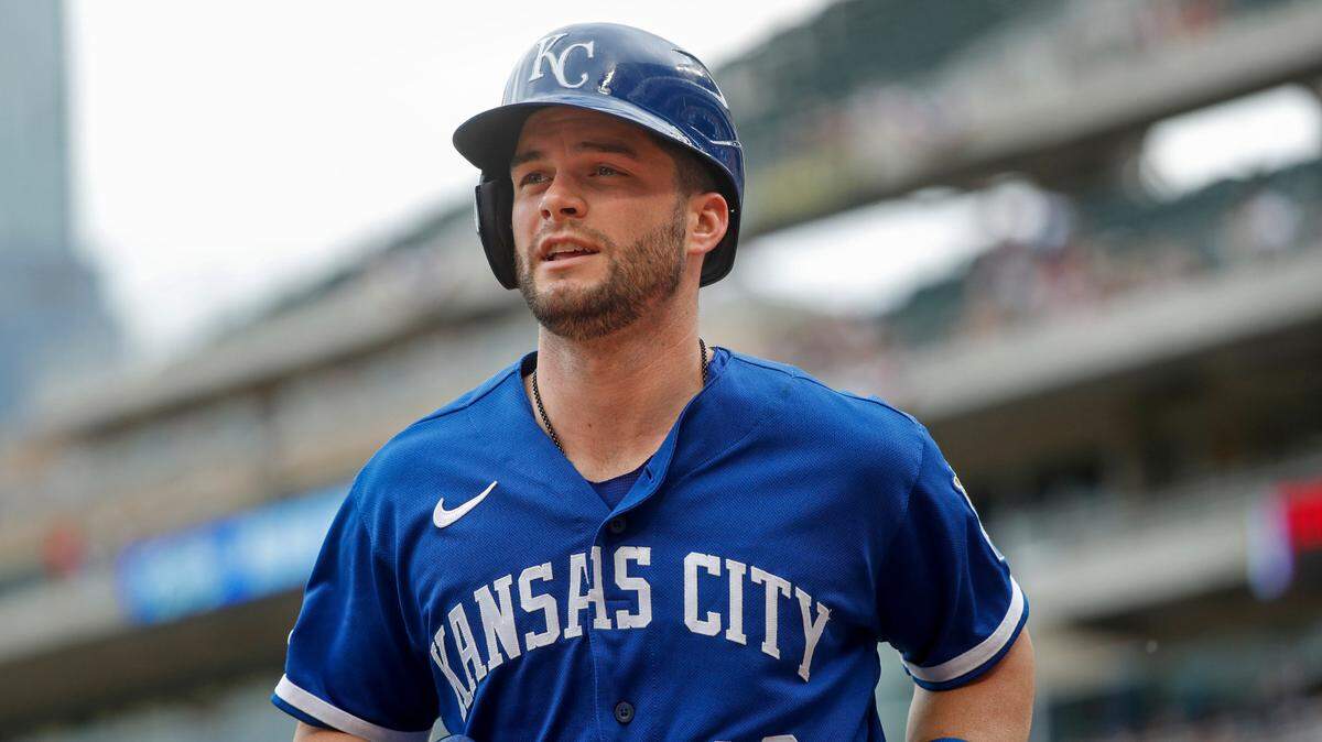Kansas City Royals’ Andrew Benintendi returns to the dugout after scoring against the Minnesota Twins in the first inning Saturday, May 28, 2022, in Minneapolis.