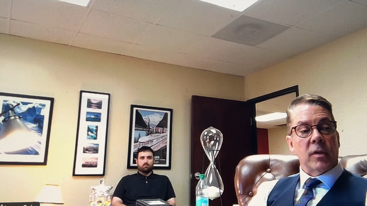 Richard Fatherley (left) is seen sitting with his attorney James Spies in a court hearing for his initial appearance on Zoom Nov. 18, 2025. Fatherley waived a reading of charges in court and another hearing was scheduled in his case.