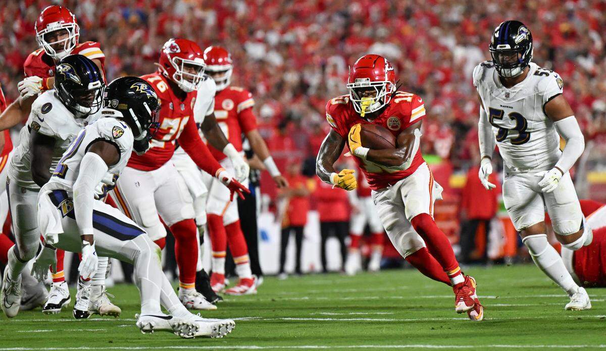 Kansas City Chiefs running back Isiah Pacheco runs for yardage against the Baltimore Ravens in the third quarter Thursday, Sept. 5, 2024, at GEHA Field at Arrowhead Stadium.