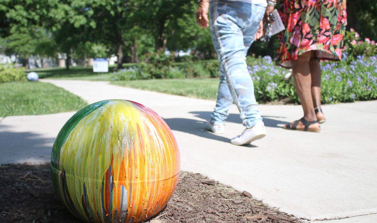 Artist Jonathan Saunders made a garden sphere entitled Rainbow Enthusiasm. All the spheres will be on display in and around Antioch Park’s rose garden until November.