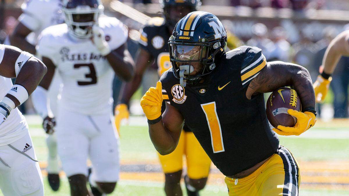 Missouri running back Tyler Badie scores a touchdown during the second quarter of an NCAA college football game against Texas A&M Saturday, Oct. 16, 2021, in Columbia, Mo. (AP Photo/L.G. Patterson)