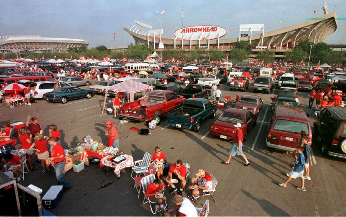 Kansas City Chiefs fans gather in the parking lot outside Arrowhead Stadium for a pre-game tailgate party before the first game of the 1998 season.