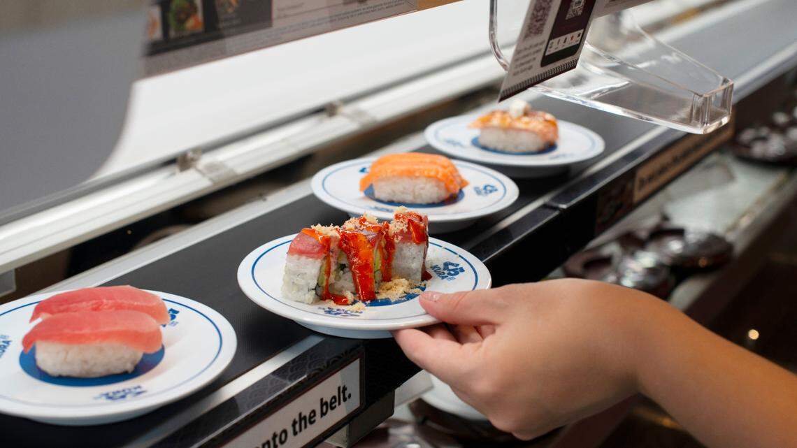 The Texan Roll arrives via conveyor belt at Kura Sushi.