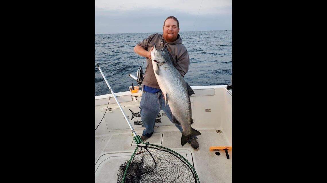 Bobby Sullivan, of Icebreaker Charters, holds the record-setting salmon.