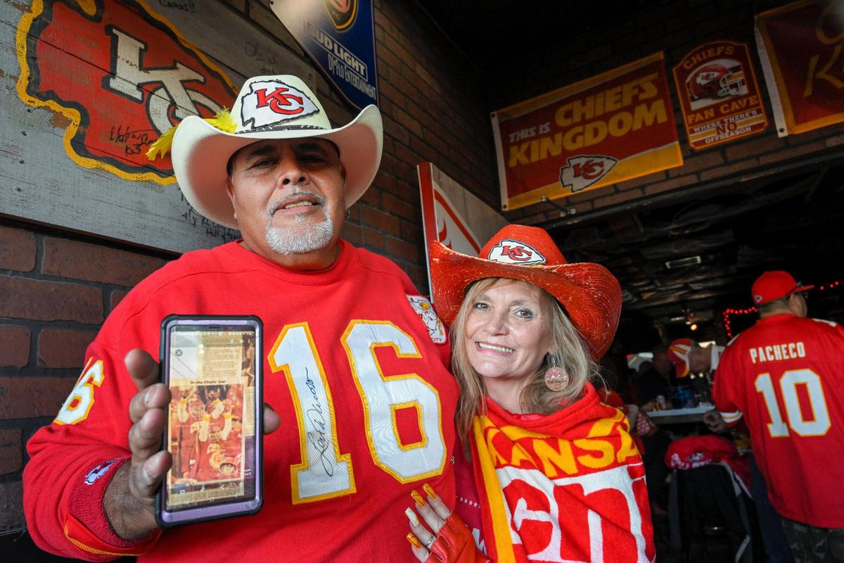 Adrian Gonzalez and Robin Adams shared a newpaper photo of Gonzalez taken in 1992 at a Chiefs Monday Night Football game in Kansas City. Gonzalez, who said he’s always been a Chiefs fan, gathered with other fans Wednesday, Feb. 8, 2023 at Pub Rock Live, a Chiefs bar in Scottsdale Arizona. The couple are from Tonopah, Arizona.