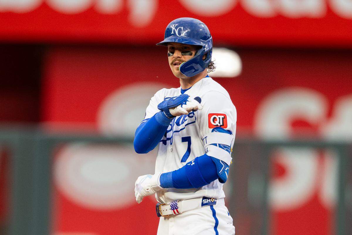Kansas City Royals shortstop Bobby Witt Jr. brushes dirt off his shoulder after hitting a double against the Boston Red Sox on Wednesday, May 20, 2026, at Kauffman Stadium.