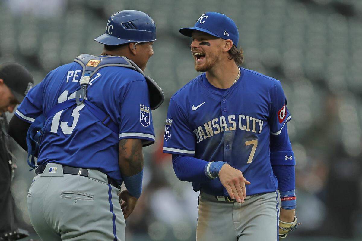 Kansas City Royals catcher Salvador Perez (13) and shortstop Bobby Witt Jr. (7) celebrate the team’s win over the Chicago White Sox after game one of a double header at Guaranteed Rate Field on Apr 17, 2024 in Chicago, Illinois, USA. M