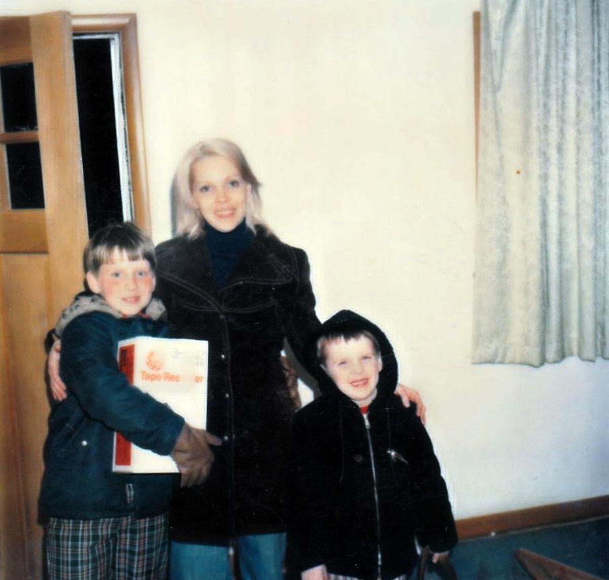 Wanda Conkling is pictured with her sons - Richard, left and Jason, right - at Christmas in 1977. Conkling was 33 when she was killed along with her husband, William Cadwalader, in 1979. Robert Gross became a suspect in the killings but was never charged.