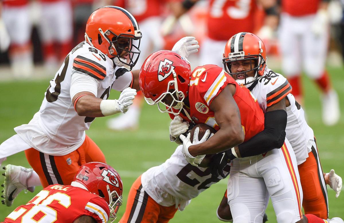Kansas City Chiefs wide receiver Byron Pringle battles for yardage agains the Cleveland Browns defense in the first half Sunday, January 17, 2021, at Arrowhead Stadium in Kansas City, Missouri.