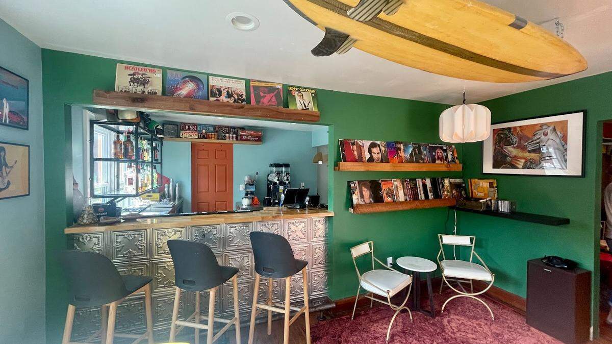 Guests at Westwood’s The House can make song requests from vinyl records that are played on an old record player that owner Malisa Monyakula has owned since she was a child.