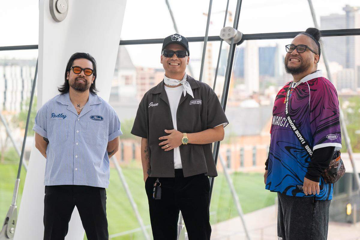 Vu Radley, left, Jesse Phouangphet and Mark Launiu, owners of Made Mobb, pose for a portrait prior to the beginning of the Red Bull Dance Your Style Midwest Regional Qualifier, on Saturday, April 25, 2026, at the Kauffman Center for the Performing Arts.