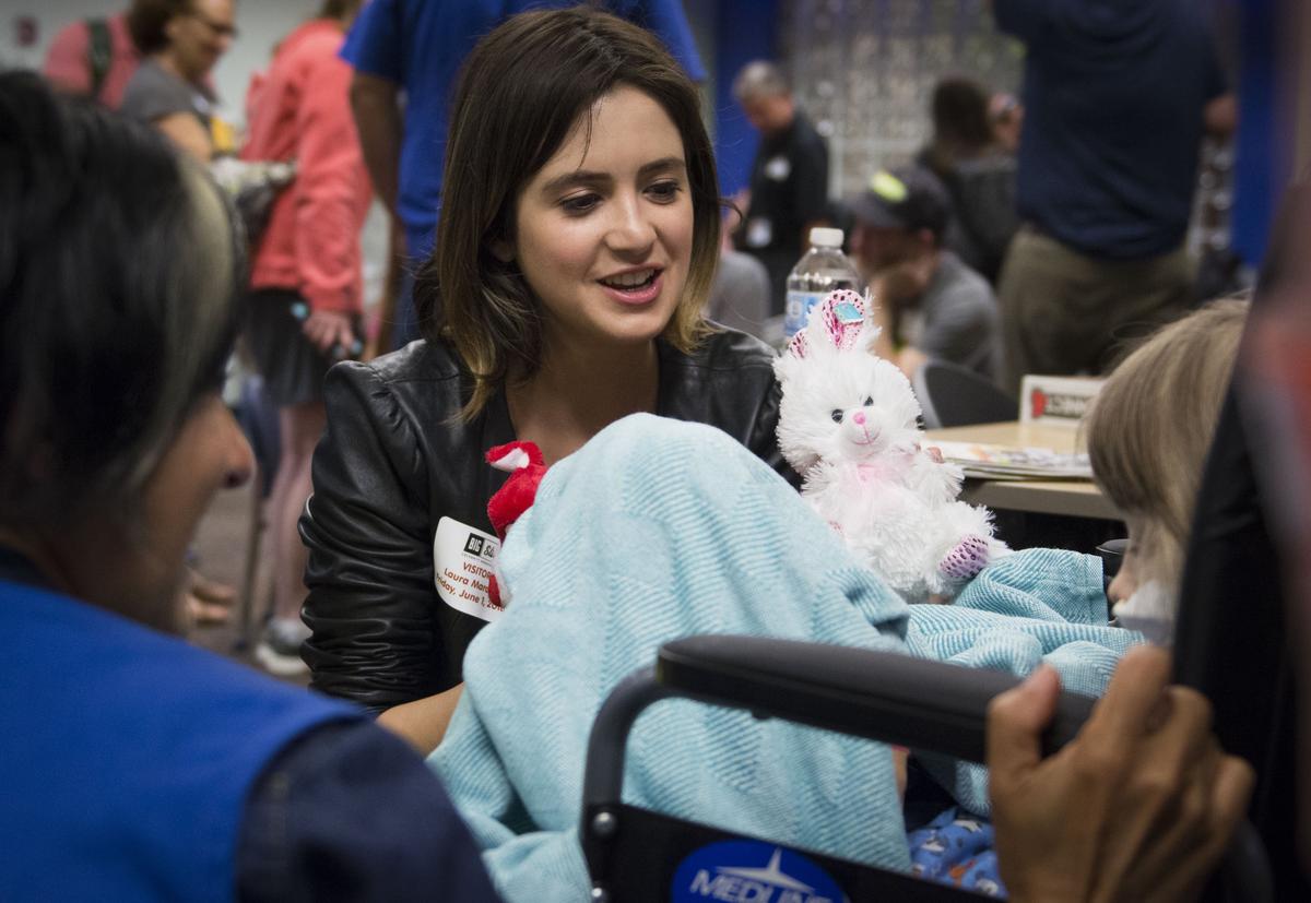 Laura Marano, who co-starred in the Oscar-nominated "Lady Bird" entertained a patient with stuffed animals at Children's Mercy.