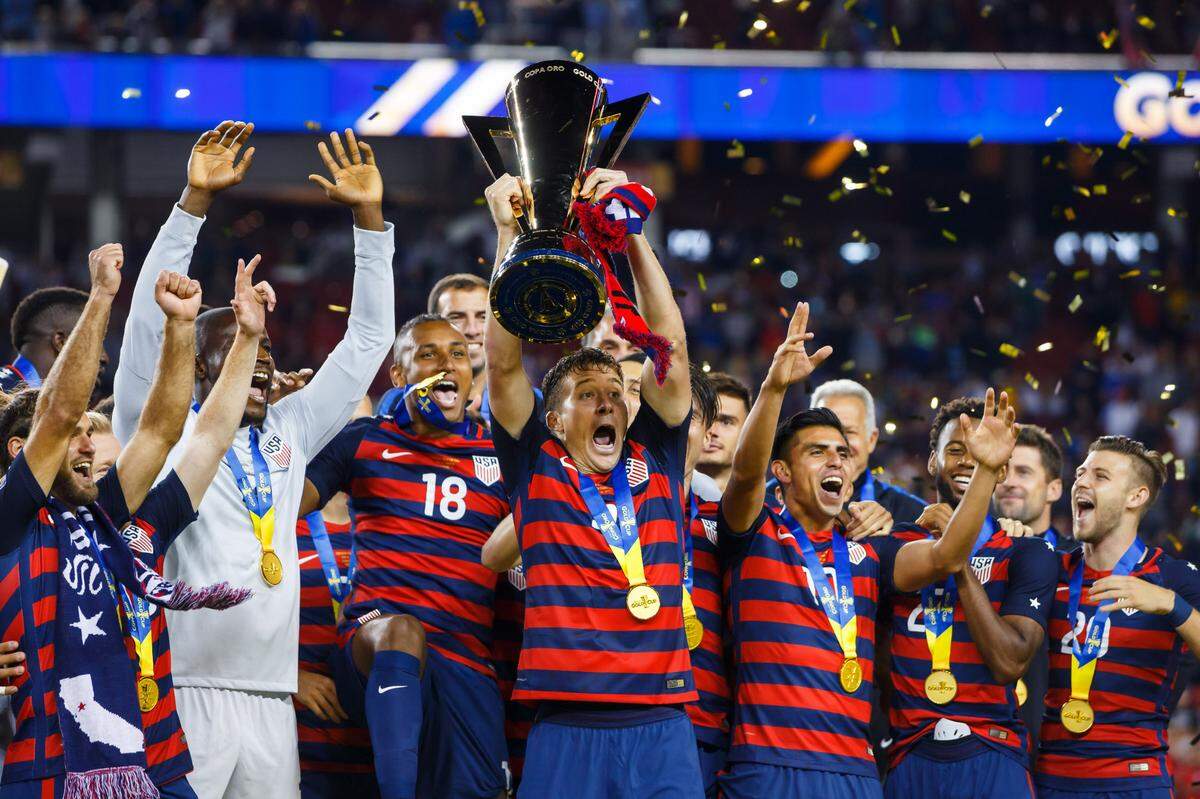 United States defender Matt Besler (5) celebrates with the trophy after defeating Jamaica during the CONCACAF Gold Cup final at Levi’s Stadium on July 26, 2017.