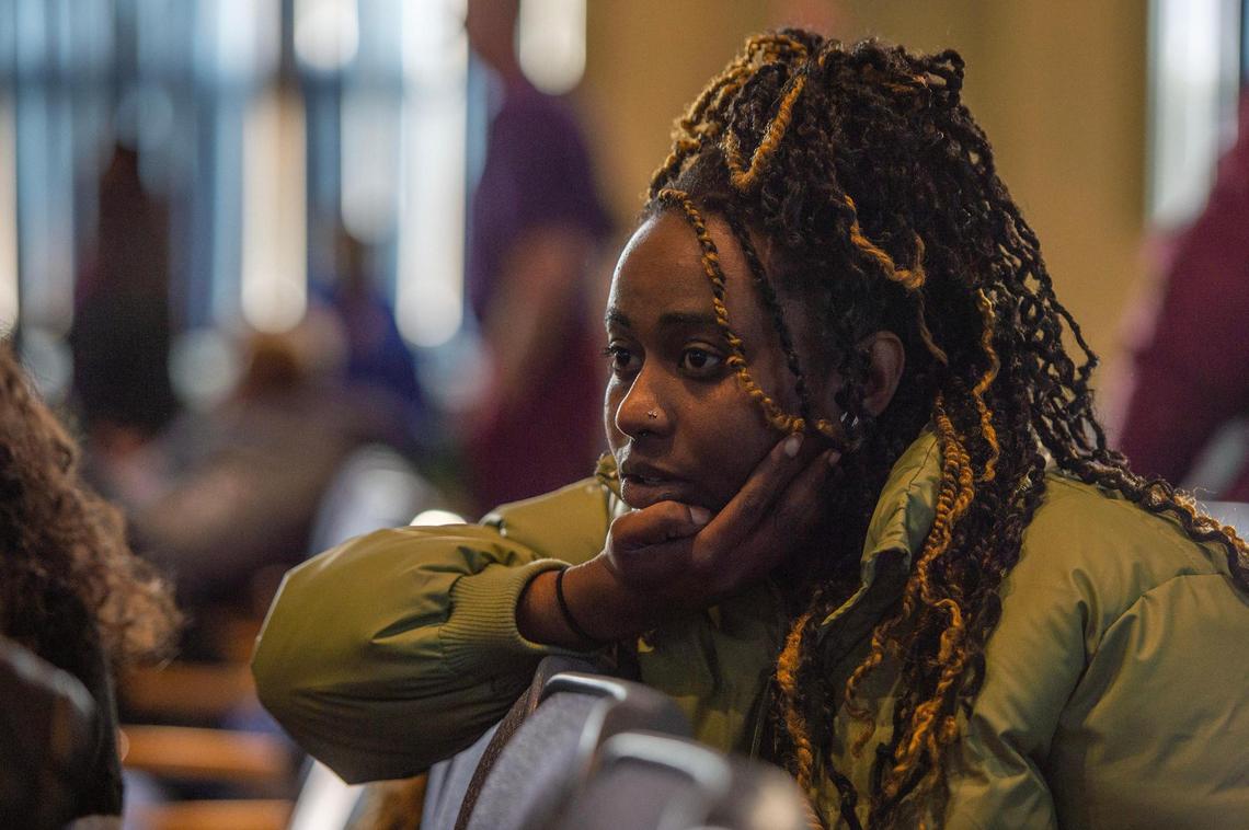 Jacquada Gray II watches the KC Tenants Power sponsored forum where candidates for the April 4 city council primary discussed housing policy at the Mohart Center on Saturday in Kansas City.