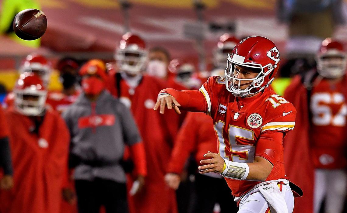Chiefs quarterback Patrick Mahomes zips a pass to tight end Travis Kelce during the first half of the AFC Championship Game Sunday at Arrowhead Stadium. Kansas City beat Buffalo, 38-24.